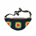 Bolsa de cintura Rasta Kukini Co. Pouchet, com alça ajustável, tecido colorido e design prático para uso diário.