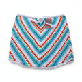 Saia de crochê Chevron turquesa e laranja da Kukini Co., detalhe de padrão em cores vibrantes e textura de malha.