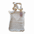 Mala crochet filet Kukini co. na cor creme natural, com detalhes em crochê e alças reforçadas, vista frontal.